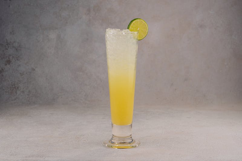 Fresh lemonade with mint garnish in a tall glass